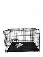 Foldable iron dog crate assembled with tray and instructions visible