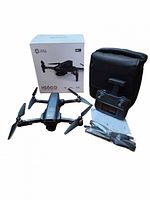 Drone, controller, carry bag, box, accessories displayed
