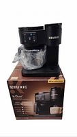 Front view of Keurig K-Duo Essentials coffee maker in original box