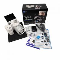 Camera, box and accessories laid out front view