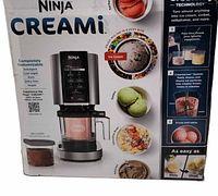 Retail box showing Ninja CREAMi features and included contents
