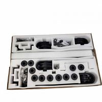 Boxed hardware kit with foam inserts holding rails, rollers, spacers and fasteners