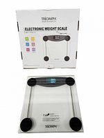 Box and unboxed Triomph electronic weight scale