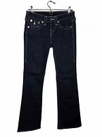 Front view of jeans showing overall style and contrast stitching