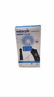 Front view of sealed Waterpik Cordless Plus water flosser retail box