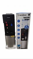 Water dispenser and retail box showing brand, model, dual taps, Energy Star logo