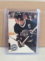 Front view of card showing player image and foil NHL emblem in plastic case