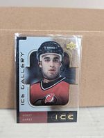 Front view of Scott Gomez Ice Gallery card in top loader
