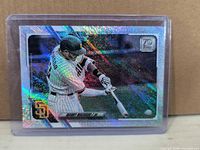 Front view showing rainbow foil finish, player image, Topps 70 logo