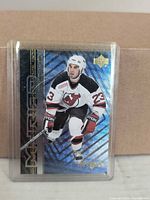 Front of Scott Gomez Myriad card in sleeve