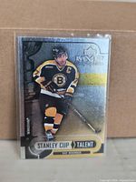 Front of Ray Bourque Upper Deck MVP Stanley Cup Talent holographic card in top loader