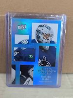 Front view of Upper Deck UD Portraits Thatcher Demko card in sleeve