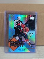 Front of Nick Cousins Check Point card in top loader