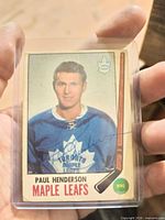 Front of autographed Paul Henderson Maple Leafs card in plastic holder