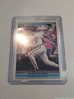Front of Cal Ripken Jr. Score baseball card inside hard plastic loader