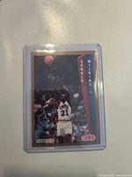 Front of 1992-93 Fleer Gerald Wilkins card in top loader