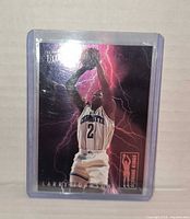 Front of Fleer Ultra Larry Johnson Scoring Kings card in holder