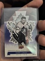 Front of Harry Lumley Centennial hockey card in sleeve