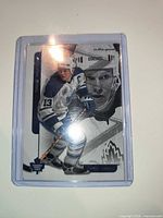 Front of Mats Sundin hockey card in top loader