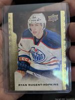 Front of Ryan Nugent-Hopkins Upper Deck Masterpieces card in top loader