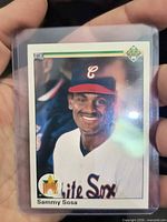 Front view of Sammy Sosa rookie card in sleeve