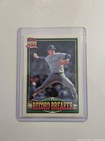Front view of Topps Record Breaker Nolan Ryan card in top-loader