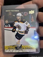 Front of David Pastrnak World Junior Grads trading card in protective sleeve