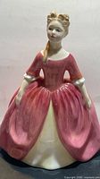 Front view of Royal Doulton Debbie figurine showing full gown and pose