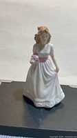 Front view of Royal Doulton girl figurine