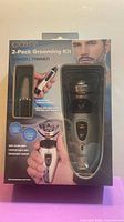 Front of sealed Coby 2-Pack Grooming Kit box showing shaver and trimmer