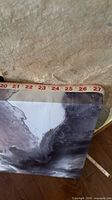 Canvas width with tape measure showing about 27 inches