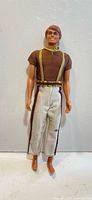 Full view of Ken doll front with outfit