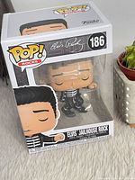 Front of boxed Funko Pop Rocks #186 Elvis Jailhouse Rock figure
