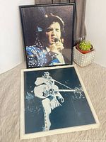 Both Elvis Presley prints: framed color photo and larger monochrome calendar page