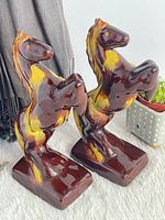 Front view of both rearing horse bookends