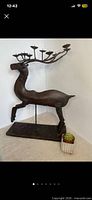 Full view of iron reindeer candelabra showing overall form and size
