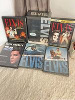 Front view showing all six sealed DVD packages