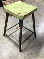 Full angled view of stool showing overall form and condition