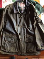 Front view of Outback Trading Pathfinder oilskin jacket showing collar, pockets and overall wear