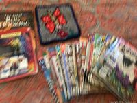 Group shot showing books, magazines stack, and trivet