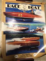 Classic Boat race poster depicting three wooden raceboats