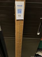 Cardboard box containing driveway marker set