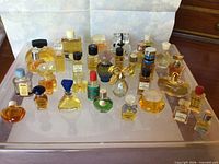 Tray with 32 miniature perfume bottles