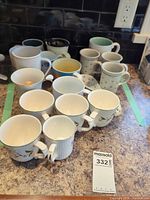 Group of assorted mugs on counter