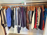 Full clothing rack showing quantity and variety