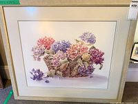 Full view of framed floral print with frame and mat