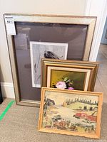 All three framed artworks together