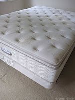 Queen Beautyrest pillow-top mattress on matching box spring