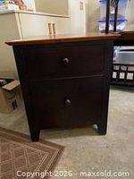 Filing cabinet front view showing two drawers