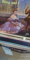 Rodgers and Hammerstein's The King and I soundtrack LP atop record stack